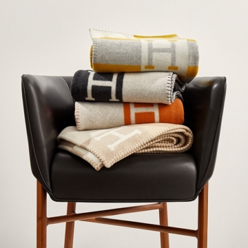 Stack Of Hermès Avalon Blankets On An Hermès Cabriolet Chair